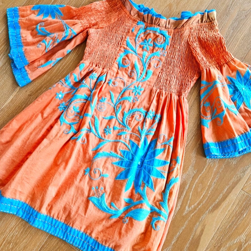 Summery sassy sexy off shoulder southwestern dress.